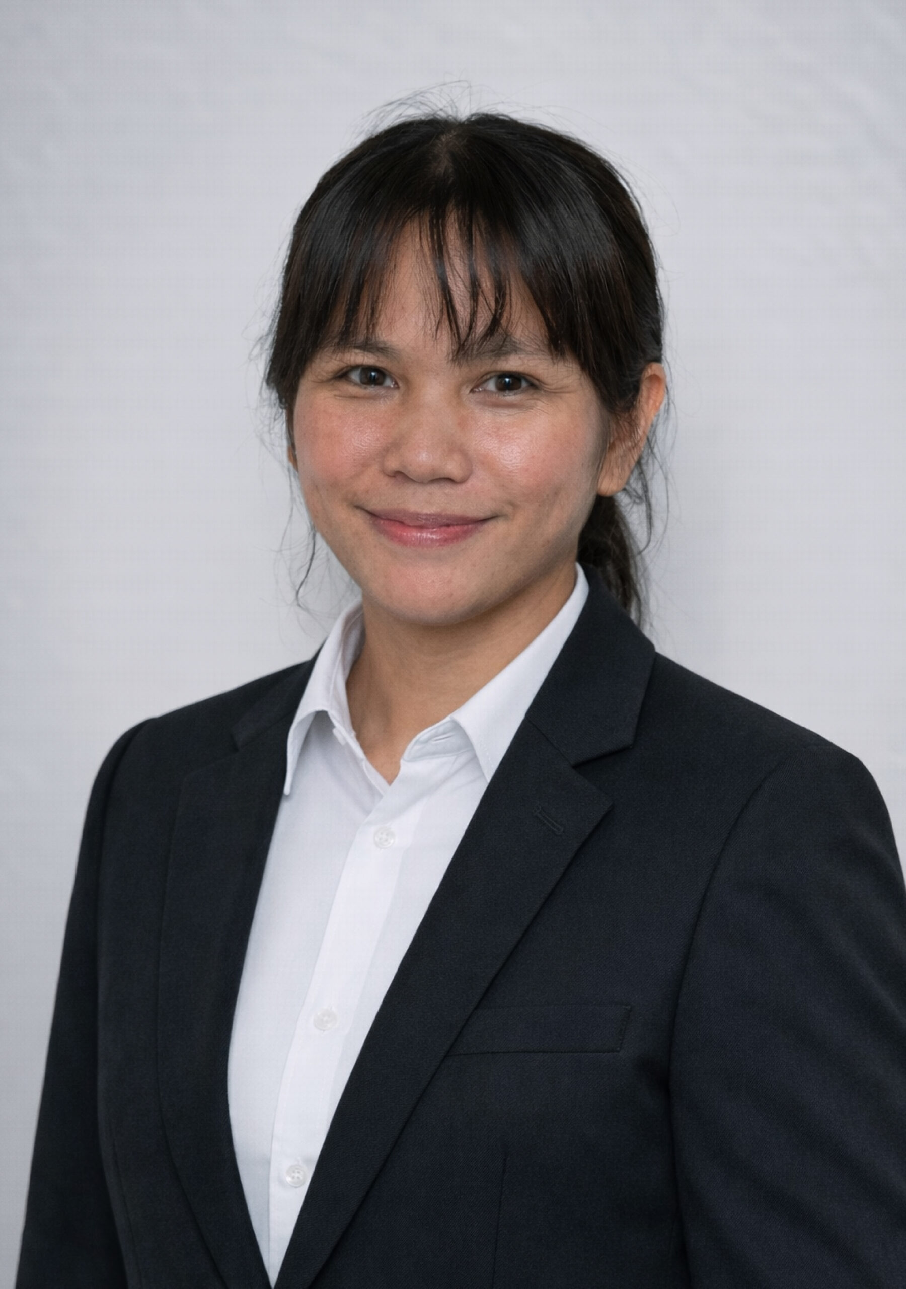 Venancia Maengkom, S.Pd., M.Si